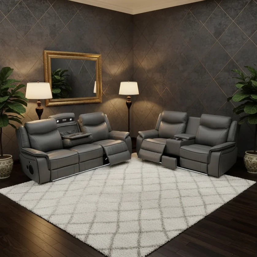 Gray recliner sofa set in a dimly lit room with decorative elements. Envogue Furniture 